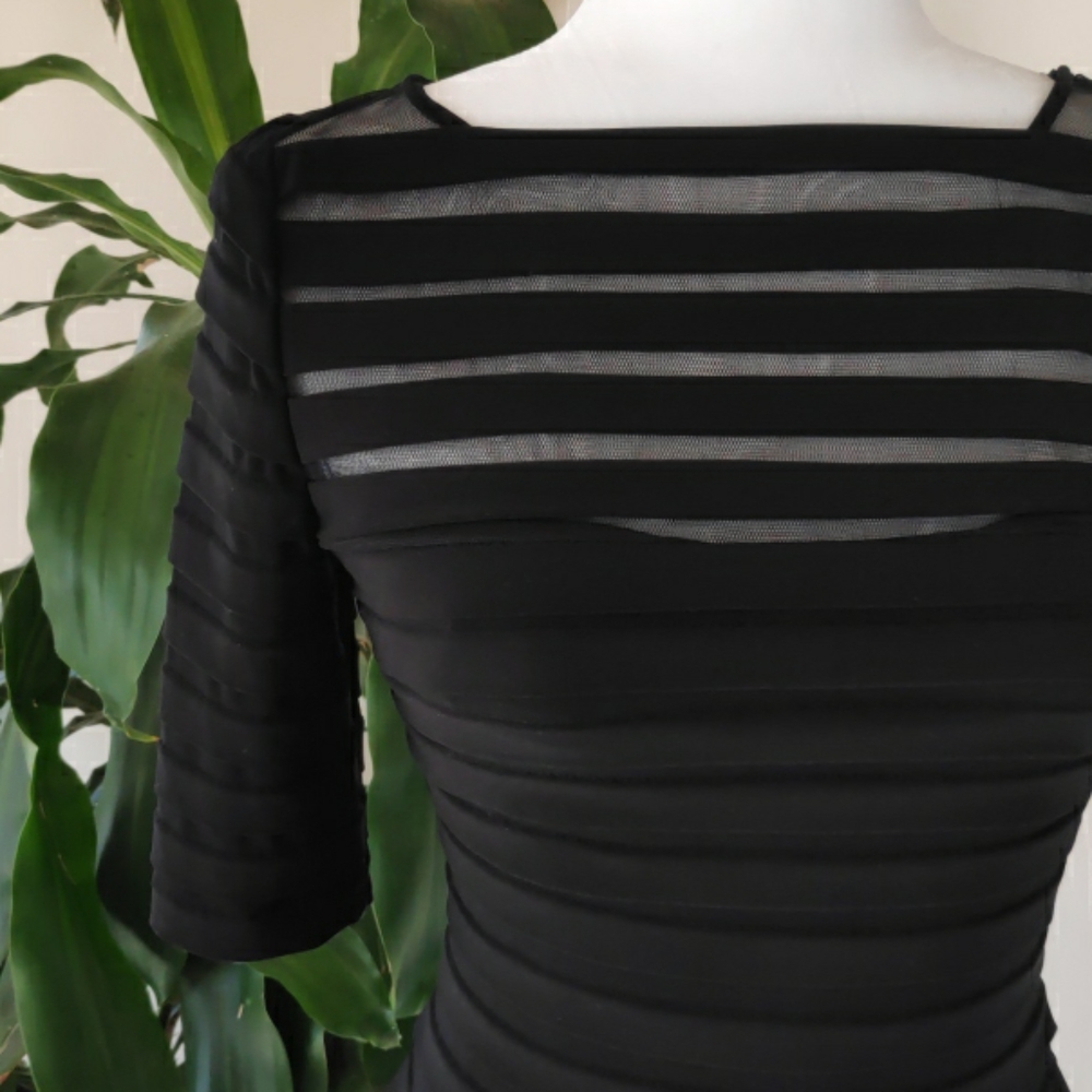 Sexy body hugging black dress by Adrianna Papell s
